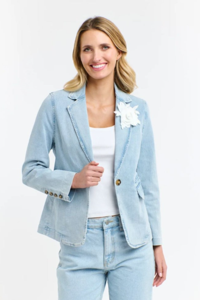 Denim blazer with flower brooch