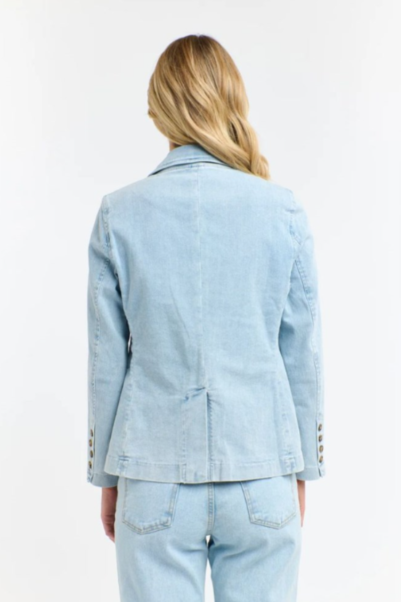 Denim blazer with flower brooch