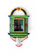 Decorative wall piece with a portrait of a woman, hearts, and a dove on a white background
