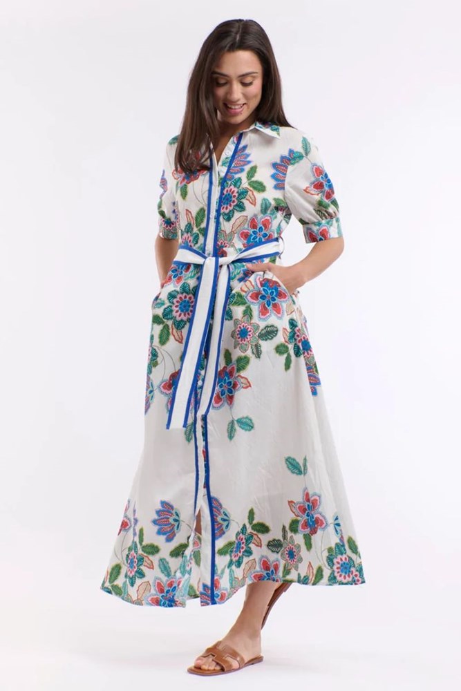 Woman wearing a floral dress with a white background