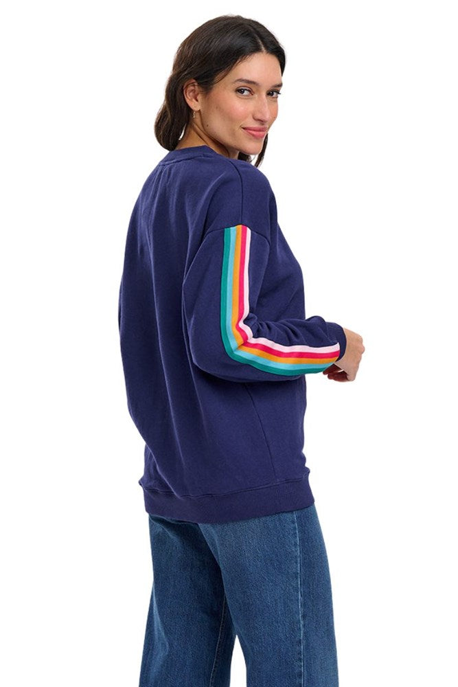 Shop Noah Sweatshirt by Sugarhill Brighton - Navy, Rainbow Trim - Origen Imports