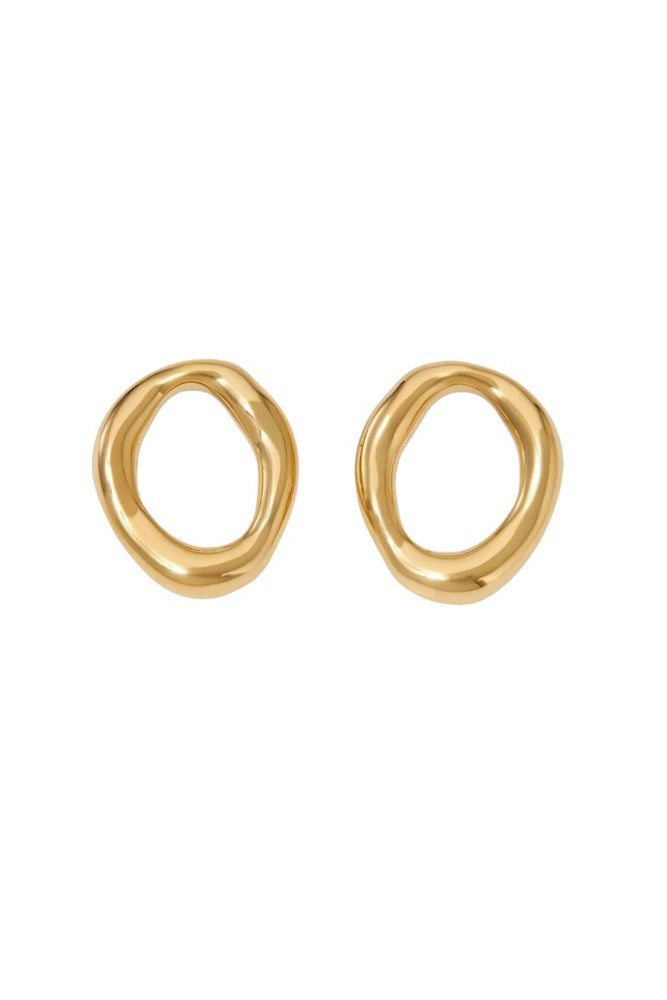 A pair of gold-toned, abstract oval hoop earrings on a plain white background.